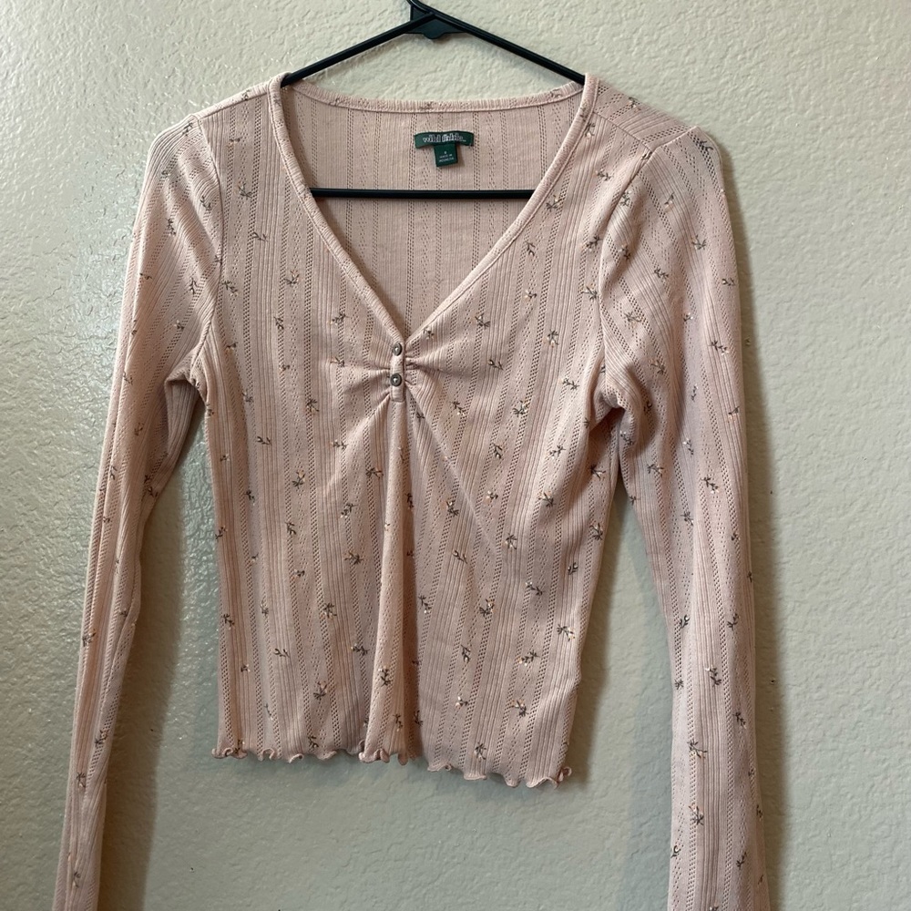 Pink top with white flowers